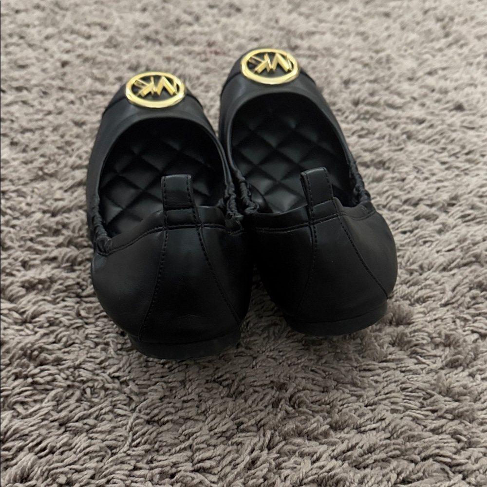 Michael Kors Black Ballet Flats with Gold Emblem - Picture 3 of 4